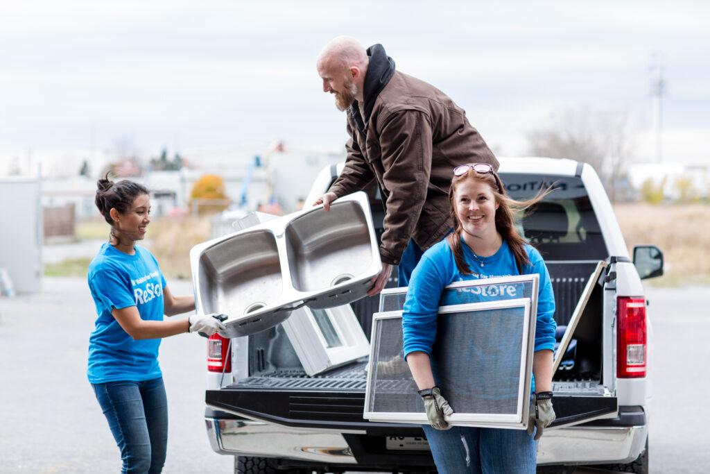 Man donates building supplies to Habitat ReStore volunteers