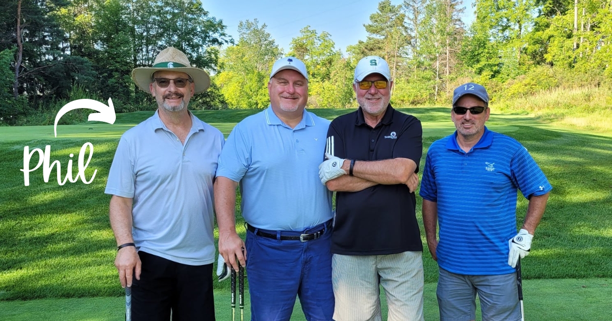 Phil Heinz, monthly donor, at the Home in One Golf Outing with his team.