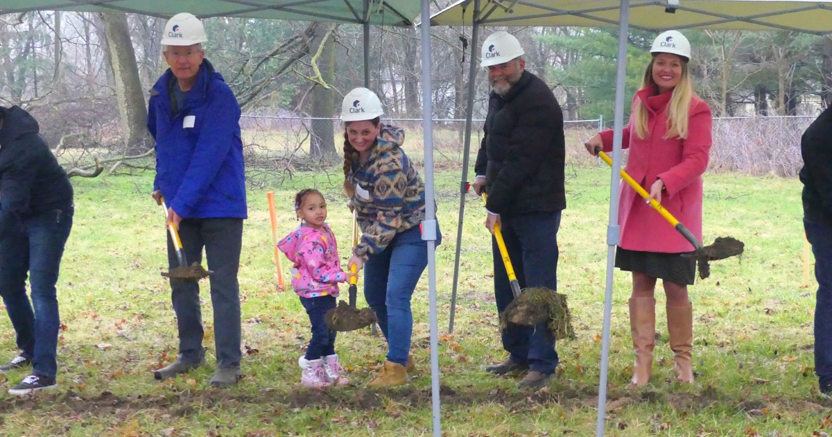 Carly and her daughter break ground on their full circle home alongside Habitat partners.