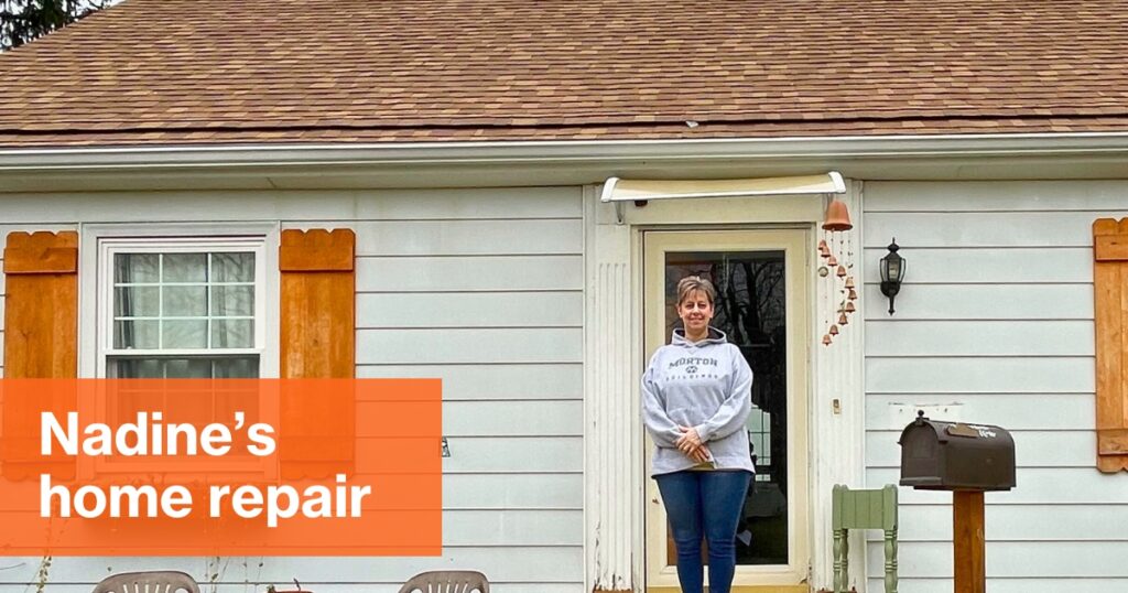 Nadine's home repair: Nadine stands in front of her home with a new roof.