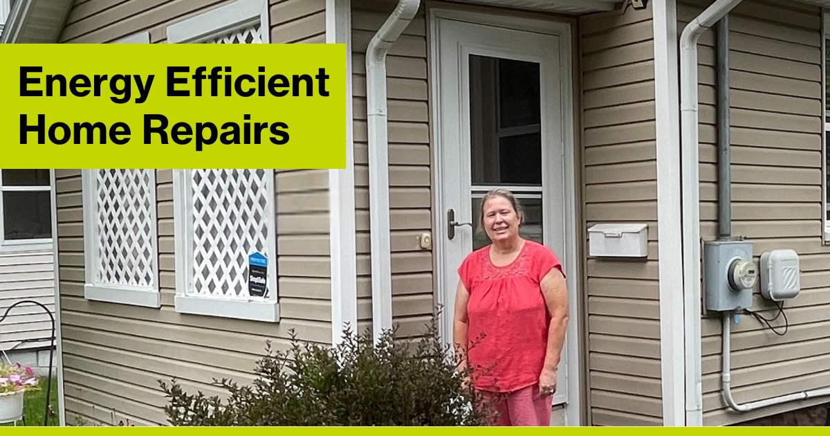 Jill's Energy Efficient Home Repairs: Habitat Repair Partner, Jill, stands in front of her recently repaired home.